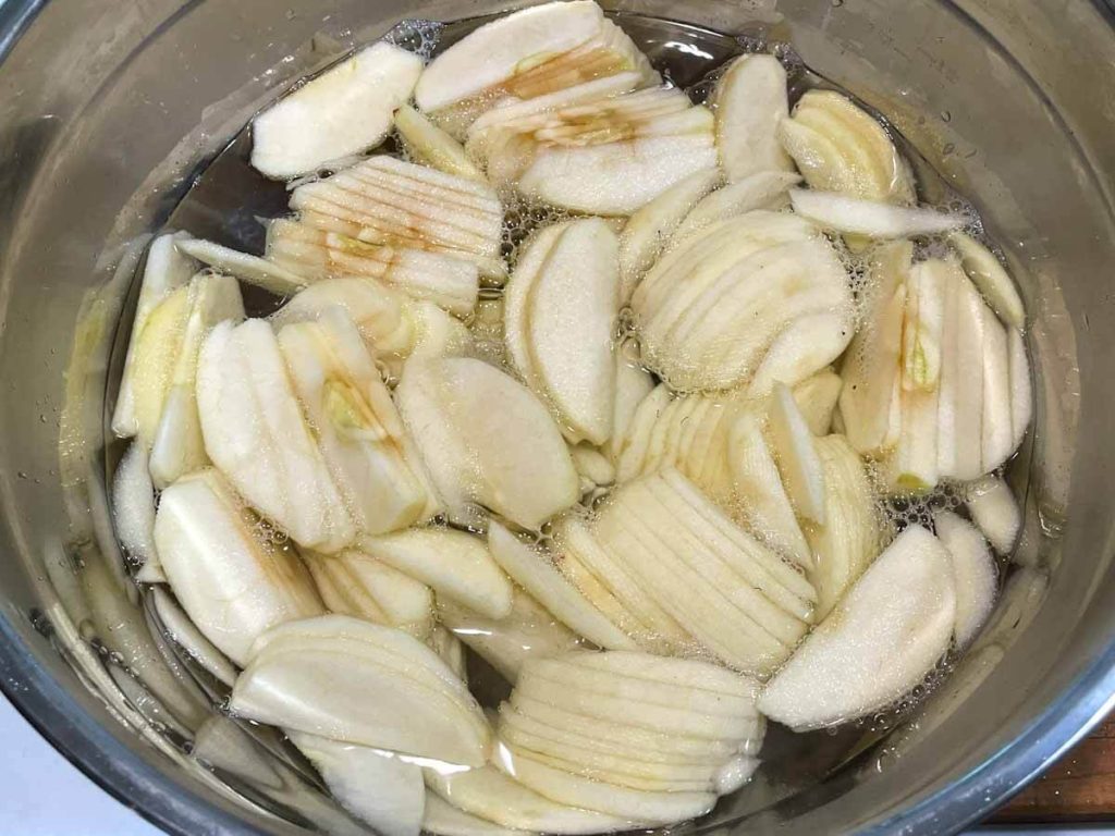 boiling water covering apple slices to make homemade dairy free egg free apple pie