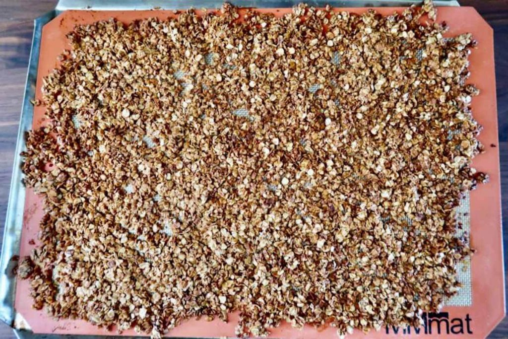 homemade espresso granola on a silicone baking mat