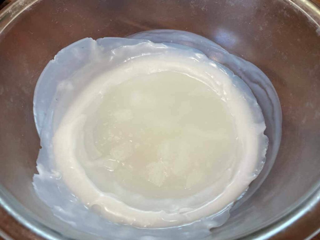 solid tallow in a bowl for making whipped tallow balm
