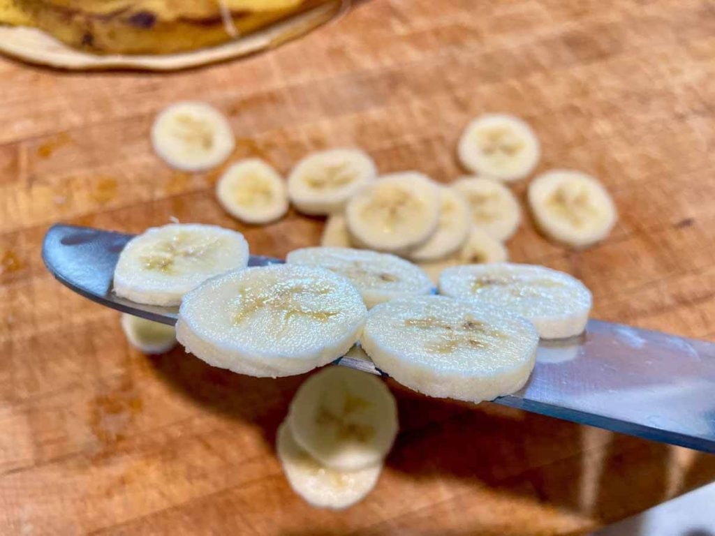 sliced bananas on a knife